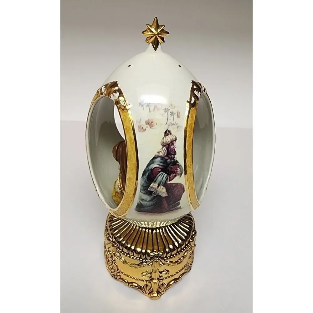Home For The Holiday Porcelain Egg-Shaped Musical Box Revolving Nativity/Santa